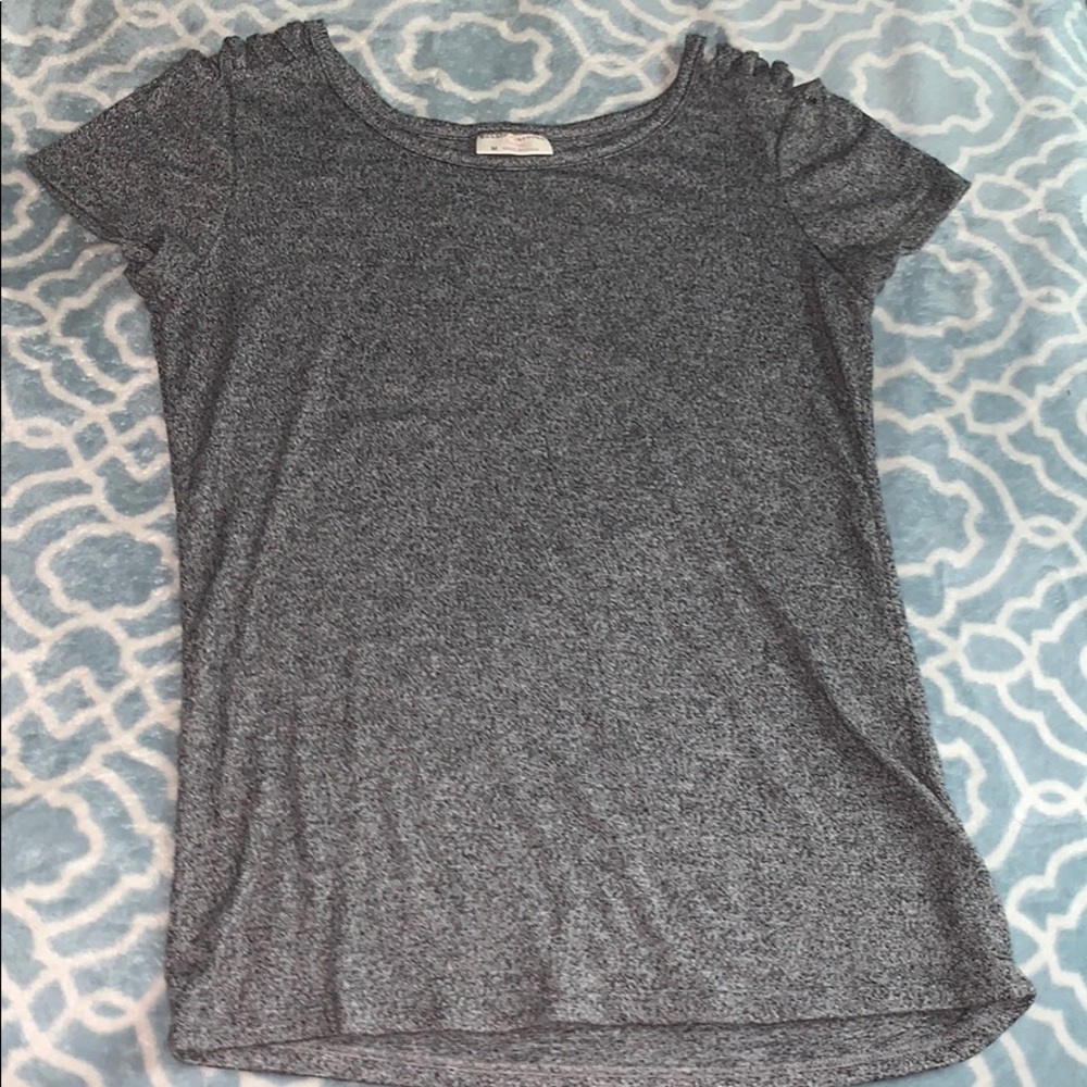 Salt and pepper colored shirt.